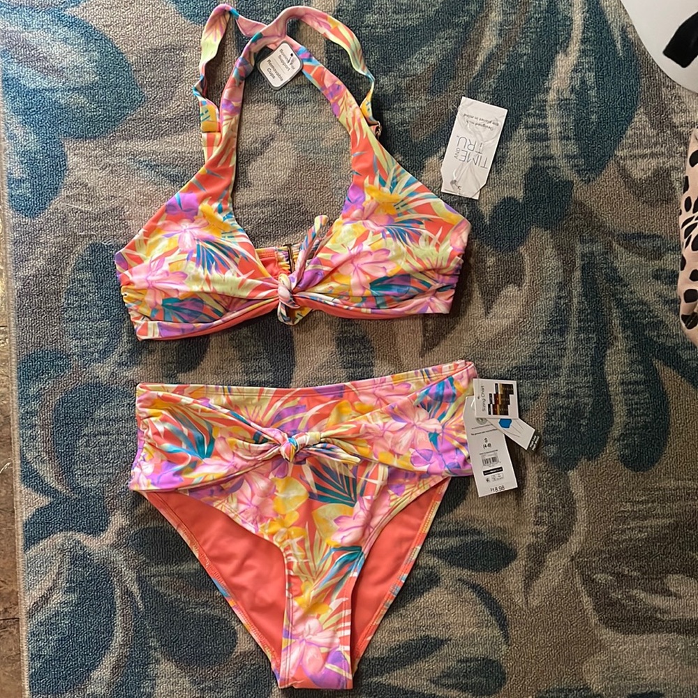 Hawaiian print swim suit Top  size M bottoms are a S NWT